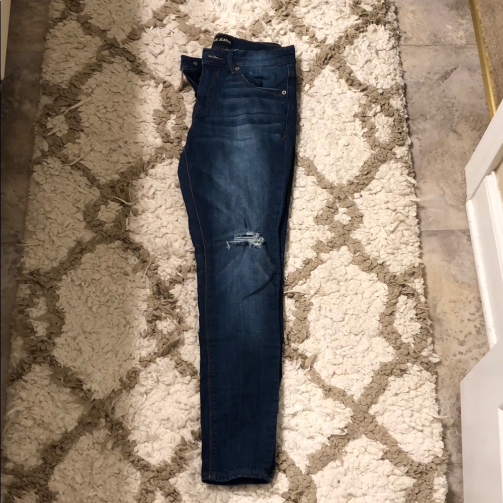 Dark wash jeans.